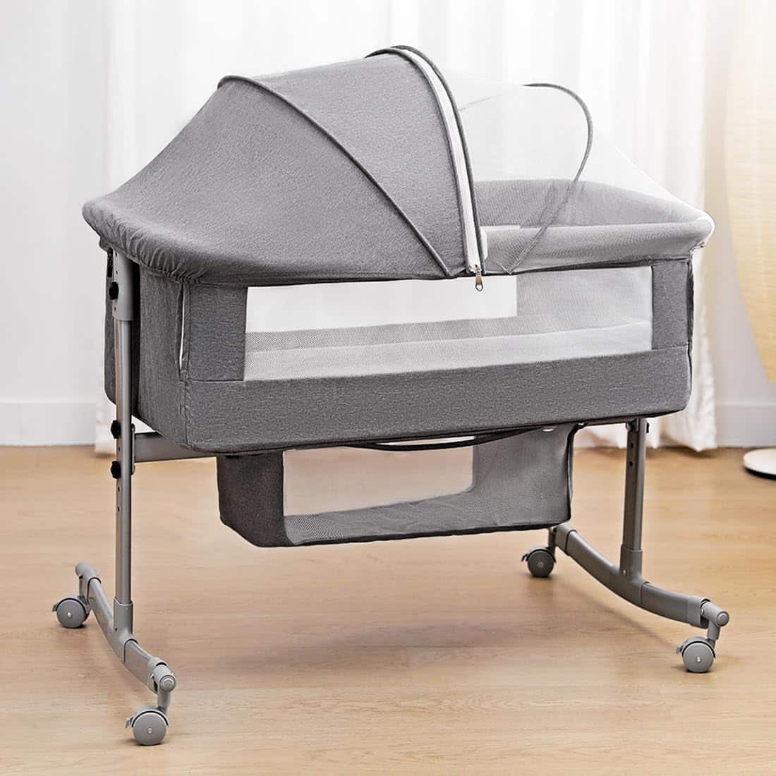 Read more about the article Bedside Crib for Baby, 3 in 1 Bassinet with Large Curvature Cradle, Bedside Sleeper Adjustable and Movable Beside Bassinet with Mosquito Nets, Safety Certificattion Guarantee (Grey)