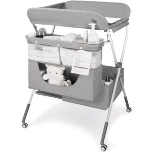 Read more about the article Changing Table, Portable Baby Changing Table with Adjustable Height – Foldable Changing Station with Nappy Mats, Baby Pots, Locking Wheels, Safety Belt & Large Storage, Ideal for Newborn and Infants