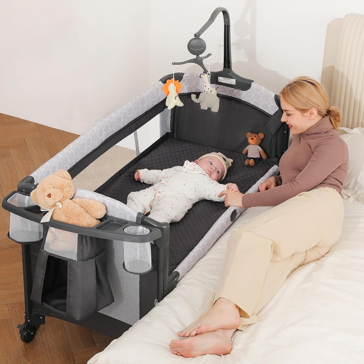 You are currently viewing ELEMARA 4 in 1 Wide Baby Bassinet Bedside with Diaper Changer,Long Next to Bed Crib with Mattress,Sheet,Music and Blackout Cover,Playpen Travel Bed with Storage,XL Co Sleeper with 3 Adjustable Height