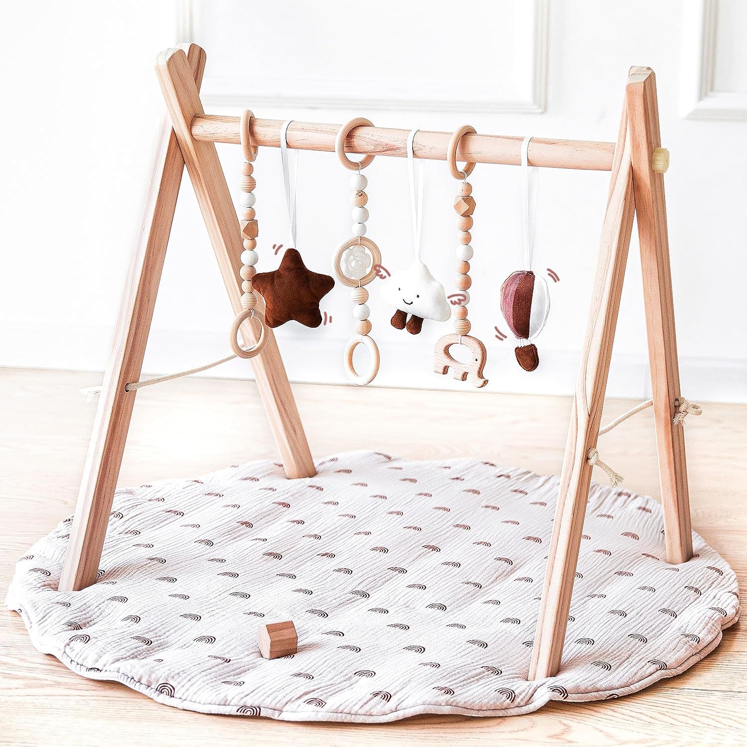 Read more about the article Wooden Baby Play Gym with Mat, Foldable Baby Play Gym Frame Activity Gym Hanging Bar with 6 Gym Baby Toys Rainbow Playmats for Newborn Baby (Natural)